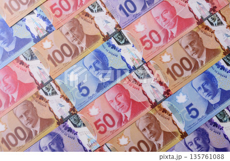 Money, currency of Canada, dollar banknotes of various denominations. Canadian money 135761088