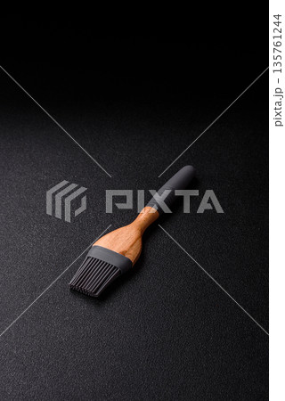 Brush, silicone kitchen utensils for cooking and baking at home. Silicone brush 135761244