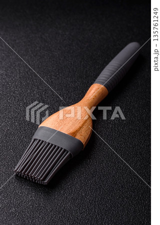 Brush, silicone kitchen utensils for cooking and baking at home. Silicone brush 135761249