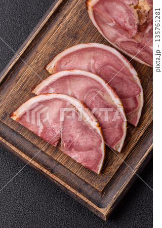 A meat roll made from pork or beef tongue slices with spices. Tongue roll A meat roll made from pork or beef tongue slices with spices. Tongue roll 135761281