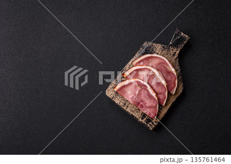 A meat roll made from pork or beef tongue slices with spices. Tongue roll A meat roll made from pork or beef tongue slices with spices. Tongue roll 135761464