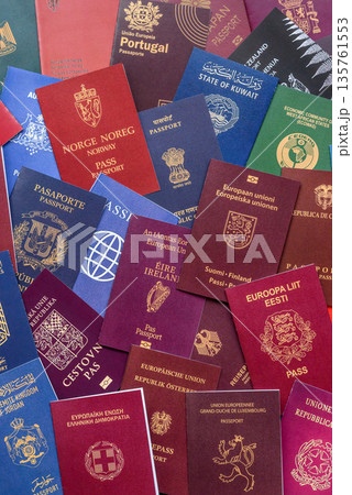 Passports of citizens of different countries of the world, passports background Passports of citizens of different countries of the world, passports background 135761553