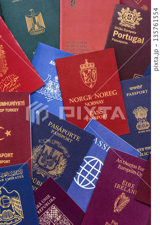 Passports of citizens of different countries of the world, passports background Passports of citizens of different countries of the world, passports background 135761554