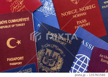 Passports of citizens of different countries of the world, passports background Passports of citizens of different countries of the world, passports background 135761560