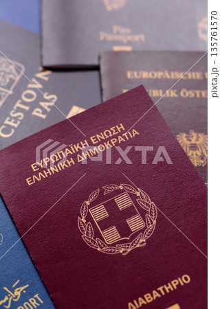 Passports of citizens of different countries of the world, passports background Passports of citizens of different countries of the world, passports background 135761570