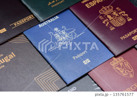Passports of citizens of different countries of the world, passports background Passports of citizens of different countries of the world, passports background 135761577