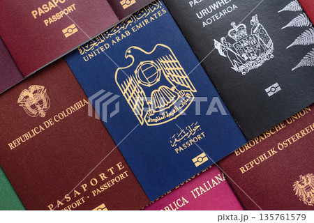 Passports of citizens of different countries of the world, passports background Passports of citizens of different countries of the world, passports background 135761579