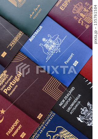 Passports of citizens of different countries of the world, passports background Passports of citizens of different countries of the world, passports background 135761584