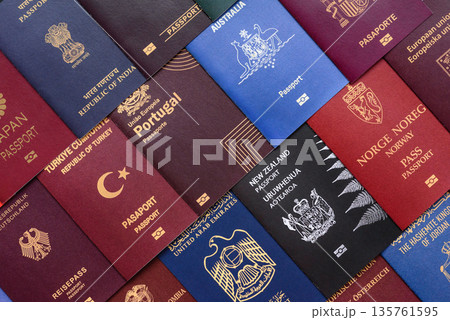 Passports of citizens of different countries of the world, passports background Passports of citizens of different countries of the world, passports background 135761595