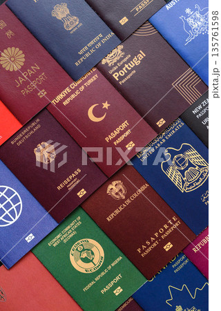 Passports of citizens of different countries of the world, passports background Passports of citizens of different countries of the world, passports background 135761598