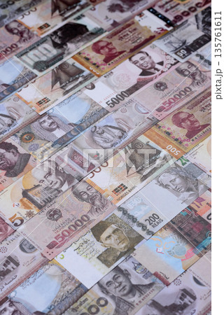 Money background, currency exchange, paper banknotes from different countries. Money cash currency 135761611