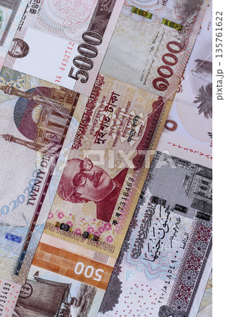 Money background, currency exchange, paper banknotes from different countries. Money cash currency Money background, currency exchange, paper banknotes from different countries. Money cash currency 135761622