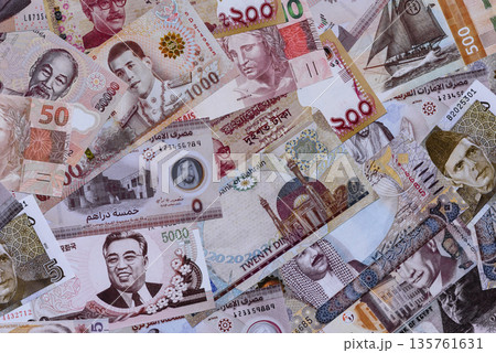 Money background, currency exchange, paper banknotes from different countries. Money cash currency Money background, currency exchange, paper banknotes from different countries. Money cash currency 135761631