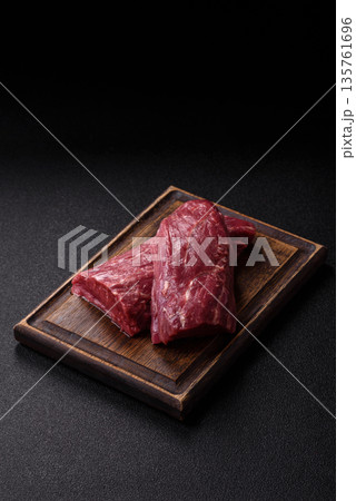 Raw meat, fresh beef tenderloin or filet mignon for grilling. Raw beef tenderloin Raw meat, fresh beef tenderloin or filet mignon for grilling. Raw beef tenderloin 135761696