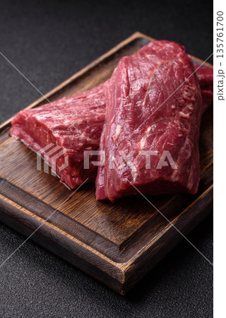 Raw meat, fresh beef tenderloin or filet mignon for grilling. Raw beef tenderloin Raw meat, fresh beef tenderloin or filet mignon for grilling. Raw beef tenderloin 135761700