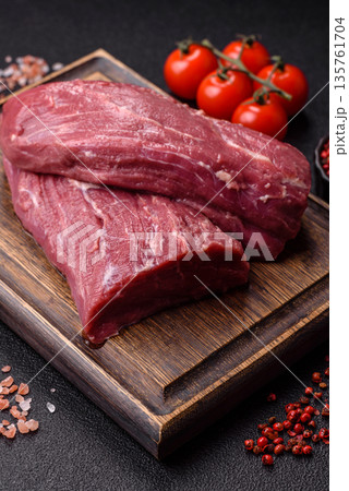 Raw meat, fresh beef tenderloin or filet mignon for grilling. Raw beef tenderloin Raw meat, fresh beef tenderloin or filet mignon for grilling. Raw beef tenderloin 135761704