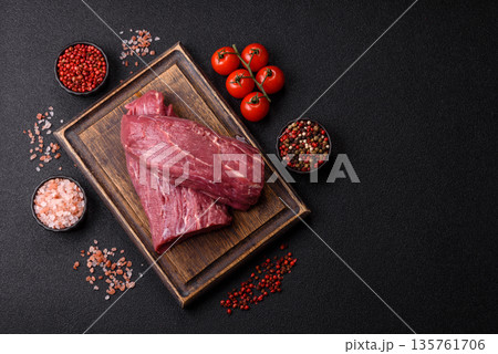 Raw meat, fresh beef tenderloin or filet mignon for grilling. Raw beef tenderloin Raw meat, fresh beef tenderloin or filet mignon for grilling. Raw beef tenderloin 135761706