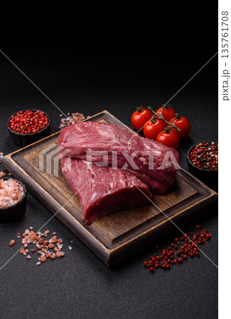 Raw meat, fresh beef tenderloin or filet mignon for grilling. Raw beef tenderloin Raw meat, fresh beef tenderloin or filet mignon for grilling. Raw beef tenderloin 135761708