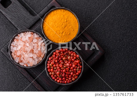 Indian spices, pepper, salt, turmeric, ingredients for cooking. Spices pepper, salt, and turmeric 135761733