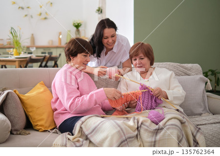 importance of female bonding in families. Enduring Art of Knitting: The age-old craft of knitting bridges the age gap between the young and the old. importance of female bonding in families. Enduring Art of Knitting: The age-old craft of knitting bridges the age gap between the young and the old. 135762364