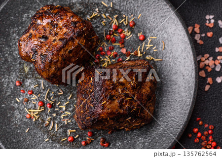Grilled or barbecued beef steak, a fillet of meat cooked for dinner. Beef steak 135762564