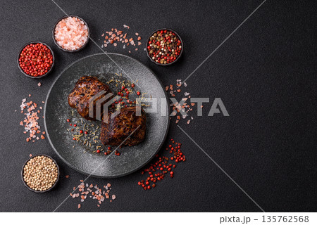Grilled or barbecued beef steak, a fillet of meat cooked for dinner. Beef steak Grilled or barbecued beef steak, a fillet of meat cooked for dinner. Beef steak 135762568