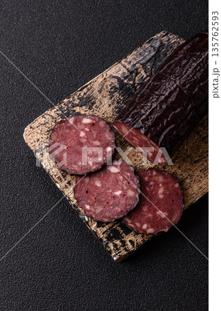 Black blood pudding, grilled pork sausage cooked for dinner. Blood pudding Black blood pudding, grilled pork sausage cooked for dinner. Blood pudding 135762593