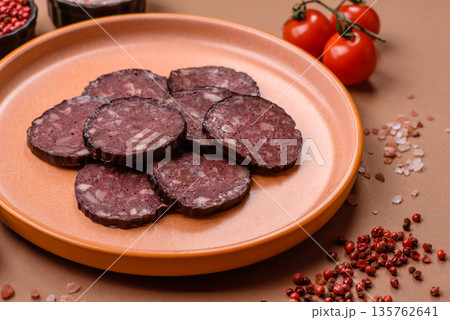 Black blood pudding, grilled pork sausage cooked for dinner. Blood pudding Black blood pudding, grilled pork sausage cooked for dinner. Blood pudding 135762641