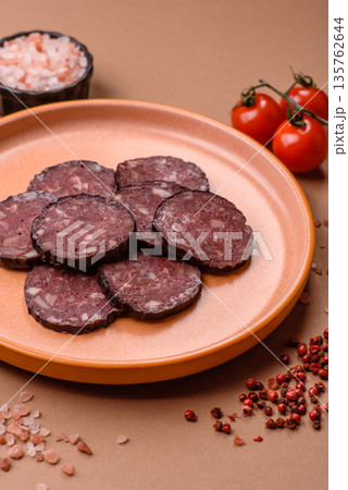 Black blood pudding, grilled pork sausage cooked for dinner. Blood pudding Black blood pudding, grilled pork sausage cooked for dinner. Blood pudding 135762644