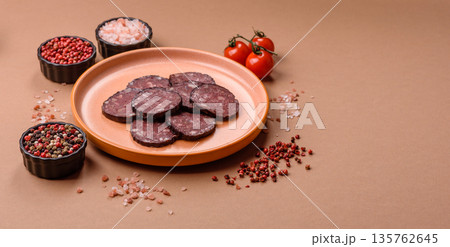 Black blood pudding, grilled pork sausage cooked for dinner. Blood pudding Black blood pudding, grilled pork sausage cooked for dinner. Blood pudding 135762645