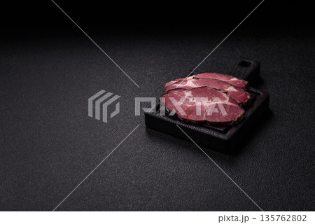 Meat, smoked ham, or pork sausage sliced for breakfast sandwiches. Sliced ham Meat, smoked ham, or pork sausage sliced for breakfast sandwiches. Sliced ham 135762802
