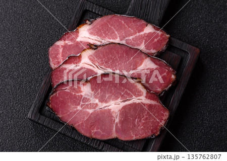Meat, smoked ham, or pork sausage sliced for breakfast sandwiches. Sliced ham Meat, smoked ham, or pork sausage sliced for breakfast sandwiches. Sliced ham 135762807