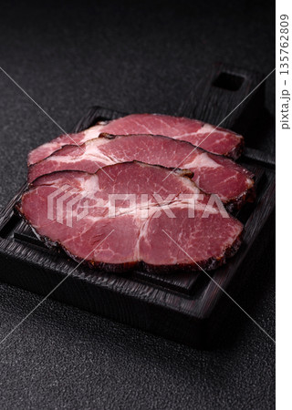 Meat, smoked ham, or pork sausage sliced for breakfast sandwiches. Sliced ham 135762809