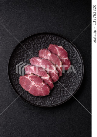 Meat, smoked ham, or pork sausage sliced for breakfast sandwiches. Sliced ham Meat, smoked ham, or pork sausage sliced for breakfast sandwiches. Sliced ham 135762820