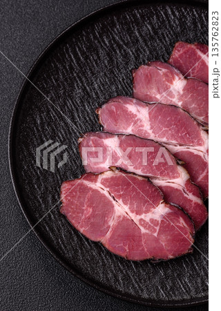 Meat, smoked ham, or pork sausage sliced for breakfast sandwiches. Sliced ham Meat, smoked ham, or pork sausage sliced for breakfast sandwiches. Sliced ham 135762823