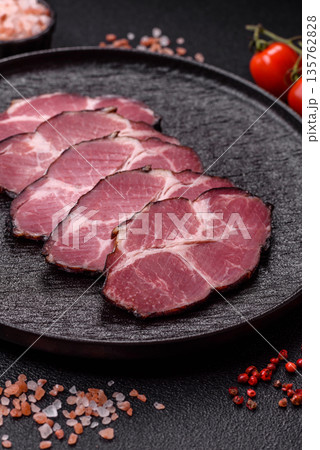 Meat, smoked ham, or pork sausage sliced for breakfast sandwiches. Sliced ham 135762828