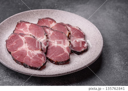 Meat, smoked ham, or pork sausage sliced for breakfast sandwiches. Sliced ham Meat, smoked ham, or pork sausage sliced for breakfast sandwiches. Sliced ham 135762841