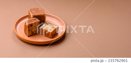A French cube croissant with chocolate filling, a sweet breakfast pastry. Cube croissant 135762901