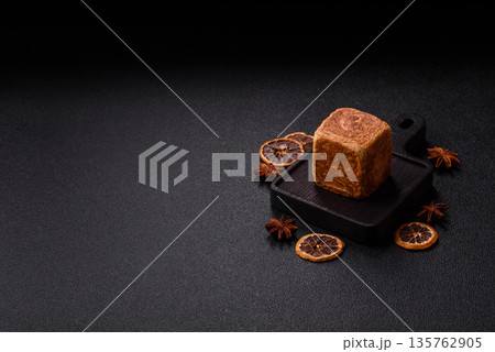 A French cube croissant with chocolate filling, a sweet breakfast pastry. Cube croissant A French cube croissant with chocolate filling, a sweet breakfast pastry. Cube croissant 135762905