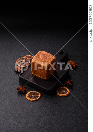 A French cube croissant with chocolate filling, a sweet breakfast pastry. Cube croissant A French cube croissant with chocolate filling, a sweet breakfast pastry. Cube croissant 135762908