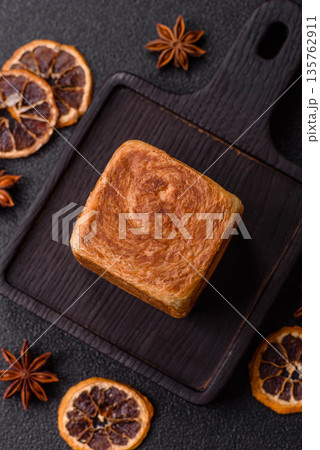 A French cube croissant with chocolate filling, a sweet breakfast pastry. Cube croissant A French cube croissant with chocolate filling, a sweet breakfast pastry. Cube croissant 135762911
