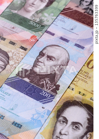Venezuelan bolivar, cash, currency of Venezuela, banknotes for transactions. Venezuelan bolivar Venezuelan bolivar, cash, currency of Venezuela, banknotes for transactions. Venezuelan bolivar 135763399