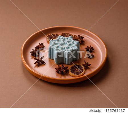 Christmas mochi, mooncake, or cheesecake shaped like a snowflake. Christmas mochi or cheesecake Christmas mochi, mooncake, or cheesecake shaped like a snowflake. Christmas mochi or cheesecake 135763487