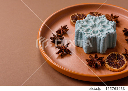 Christmas mochi, mooncake, or cheesecake shaped like a snowflake. Christmas mochi or cheesecake Christmas mochi, mooncake, or cheesecake shaped like a snowflake. Christmas mochi or cheesecake 135763488