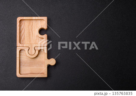 Wooden empty puzzle serving tray, kitchen accessories. A wooden empty puzzle tray 135763835