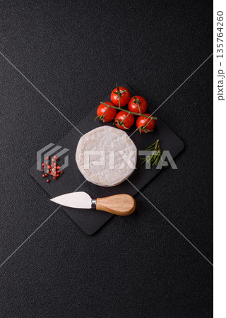 White French cream cheese Brie or Camembert for breakfast. Brie or Camembert cheese White French cream cheese Brie or Camembert for breakfast. Brie or Camembert cheese 135764260