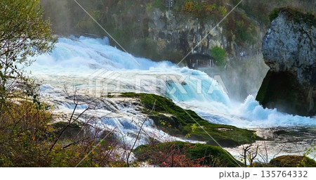 Nature Scene With Cascades And Rocks, Dynamic River And Waterfall Scene Ideal For Storytelling And Photography Nature Scene With Cascades And Rocks, Dynamic River And Waterfall Scene Ideal For Storytelling And Photography 135764332