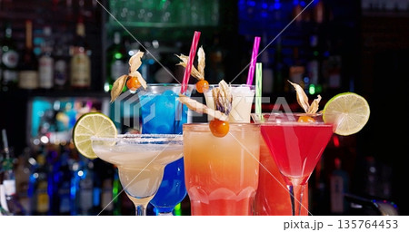 Colorful Tropical Beverages, Festive Array Of Tropical Drinks With Vibrant Colors And Accessories Colorful Tropical Beverages, Festive Array Of Tropical Drinks With Vibrant Colors And Accessories 135764453