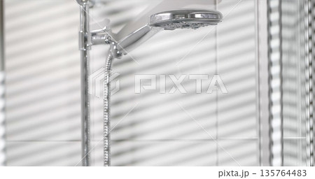 Serene Bathroom With Rainfall Shower, Minimalist Spa Setting Highlighting Ecofriendly Fixtures 135764483