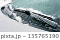 Frozen Car Windshield Wipers Covered in Ice and Snow Close-Up Frozen Car Windshield Wipers Covered in Ice and Snow Close-Up 135765190